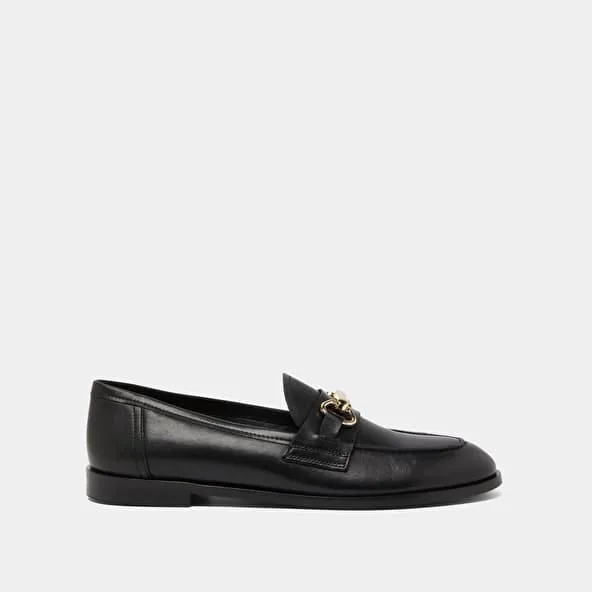 Moccasins with gold bits in black leather