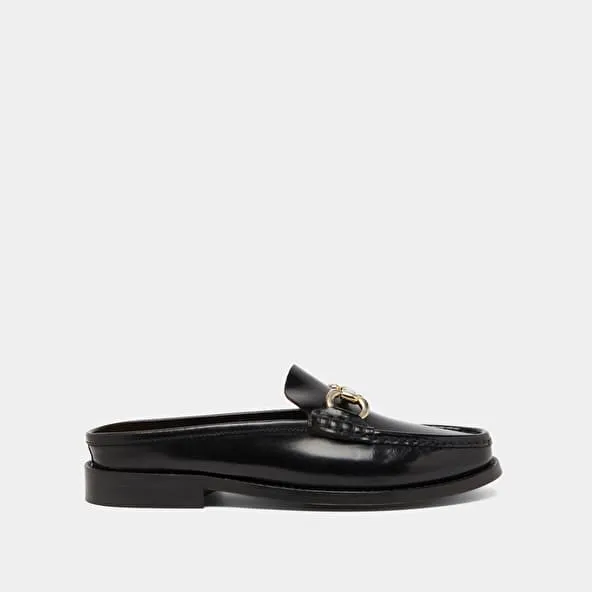 Moccasins with golden jaws in black shiny leather