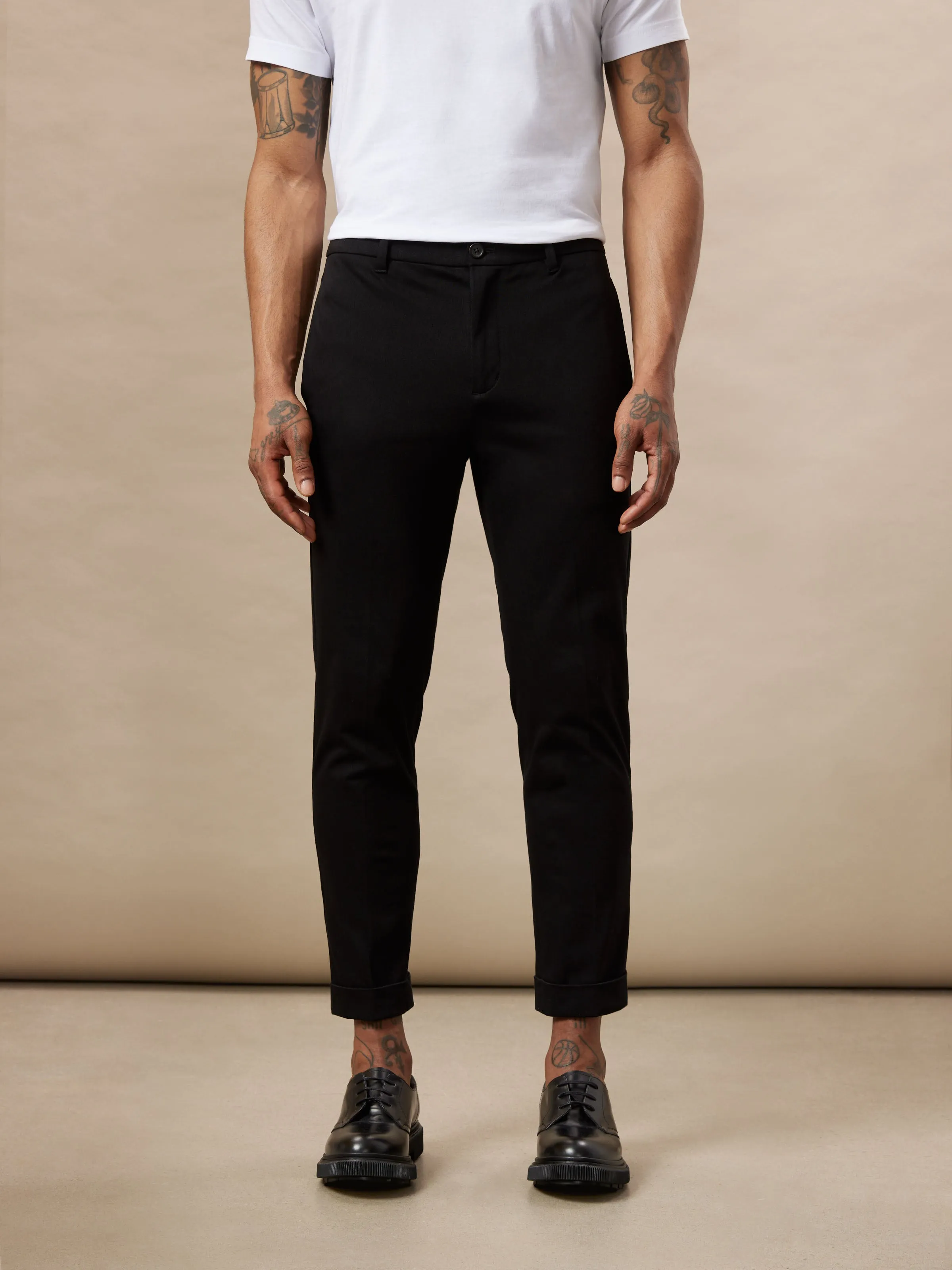 The Colin Tapered Flex Pant in Black